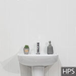 white ceiling clad sink